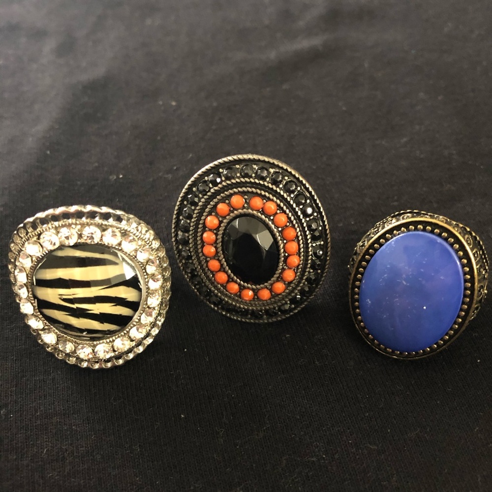 3 rings and a silver handmade bracelet
